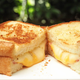 Cheese sandwich getting pulled apart